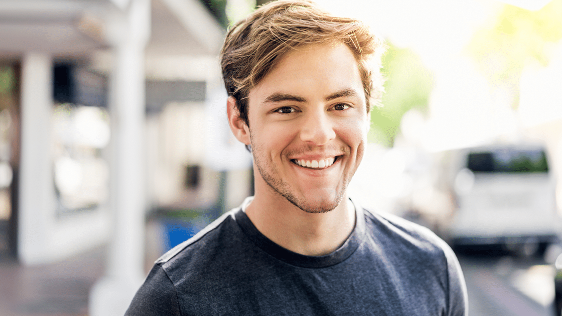 Smiling Guy With Blue Shirt